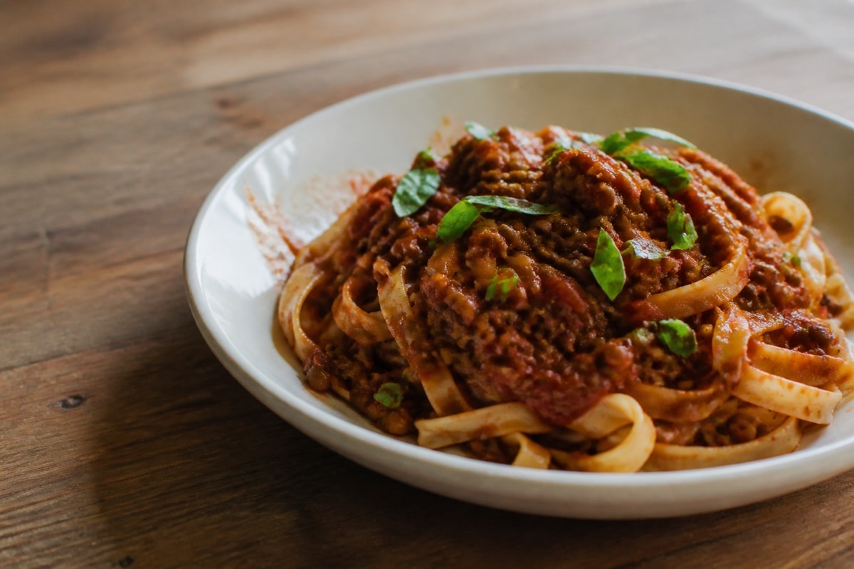 Lentil bolognese pasta in a bowl